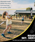 Children playing badminton with Portable 14 Foot Multi Sport Net For Badminton, Pickleball, Tennis And Soccer Tennis with foldable poles
