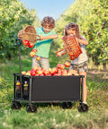 Children filling black Heavy Duty Collapsible Wagon Cart With 29.3 Inch Body 150L Capacity And 260 Lb Load Beastly Rolling Cart with apples