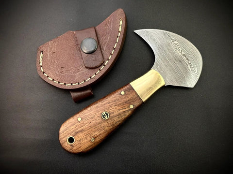 Damascus Steel Leather Cutting Knife With Round Head Blade And Wood Handle For Leather Fabric Vinyl And Crafts, shown with sheath.