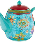 Blue Floral Ceramic Teapot 40 Oz for Tea Lovers with boho chic design, no drip pouring, ideal for eclectic home decor and entertaining.