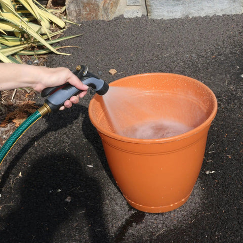 Using Hot Water Nozzle With Insulated Handle And Metal Core, Rubber Grip, Adjustable Spray From Gentle Mist To Powerful Jet on plants