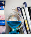 Goethe Weather Ball Barometer For Home Or Office Handcrafted Glass Weather Gauge on Bookshelf with Blue Liquid