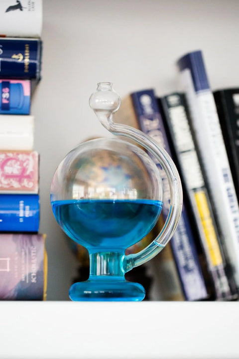 Goethe Weather Ball Barometer For Home Or Office Handcrafted Glass Weather Gauge on Bookshelf with Blue Liquid