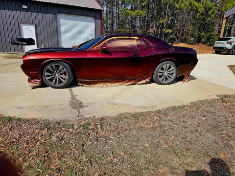 Molten Merlot Professional Car Paint Basecoat Full Gallon Volume Ready To Spray Straight Out The Can With Premium Slow Reducer For Slick Coverage And A Badass Garage Ready Finish on a vehicle side view.