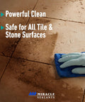 Gloved hand cleaning tile with Tile And Stone Cleaner Concentrate For Natural Stone, Tile And Grout, PH Neutral, Safe For Food Areas.