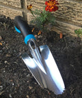Ultra Lightweight Aluminum Hand Trowel With Rust Proof Blade And Ergonomic Radius Grip near flower bed