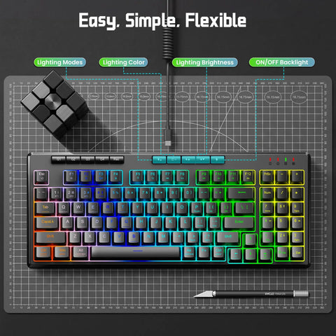 94 Key Wired RGB Gaming Keyboard Delivering Crisp Mechanical Feel And Snappy Anti Ghosting Action Alongside Four Custom Macro Keys And Large Numpad For A Truly Squad Approved Desk Setup displayed on black mat with grid.