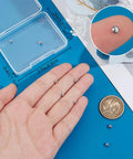 925 Sterling Silver Screw Ball Backings For Earrings 3 To 4 Mm shown on hand with a measuring guide