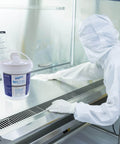 Technician using 96 Percent Isopropyl Alcohol Wipes 4000 Count Bulk Pack For Cleanrooms Labs And Sensitive Equipment inside a cleanroom.