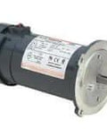 View of an industrial motor with a cylindrical black casing and metallic faceplate, featuring an extending shaft.