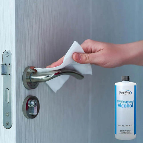 99 Percent Isopropyl Alcohol For Surface Cleaning Unscented 32 Fl Oz USA Made Methanol Free bottle and door handle being cleaned
