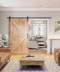 Living room with installed 9ft Barn Door Hardware Kit with I shape hanger, wood door panel up to 54 inches, carbon steel track.