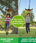 Two kids using the Ninja Twister Swing Spins Set For Backyards, 360 Degree Spin Toy And Swing Set Accessory on a tree and swing set.