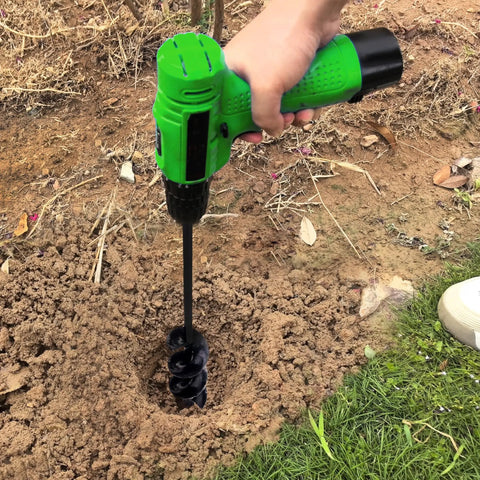 Fast And No Sweat Planting Auger Drill Bit For Cordless Drills One Point Six Inch By Sixteen Point Five Inch in use on soil