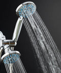 Two chrome shower heads spraying water, featuring Antimicrobial Anti-Clog High-Pressure Shower Head With 30-Setting Spray Microban Nozzle.