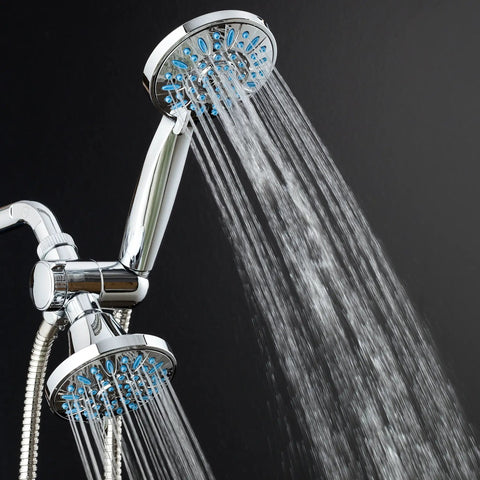 Two chrome shower heads spraying water, featuring Antimicrobial Anti-Clog High-Pressure Shower Head With 30-Setting Spray Microban Nozzle.