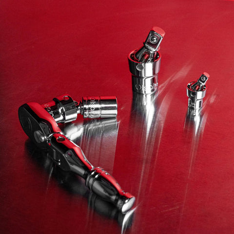 Universal Joint Set For One Half Inch, Three Eighths Inch, And One Quarter Inch Drive with swivel adapters on aluminum surface