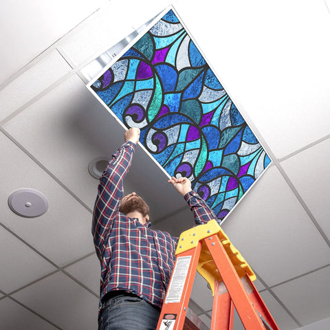 Person installing Fluorescent Light Covers For 2x4 Ceiling Fixtures With Stained Glass Design, 22.38 Inches By 46.5 Inches, 4 Pack.