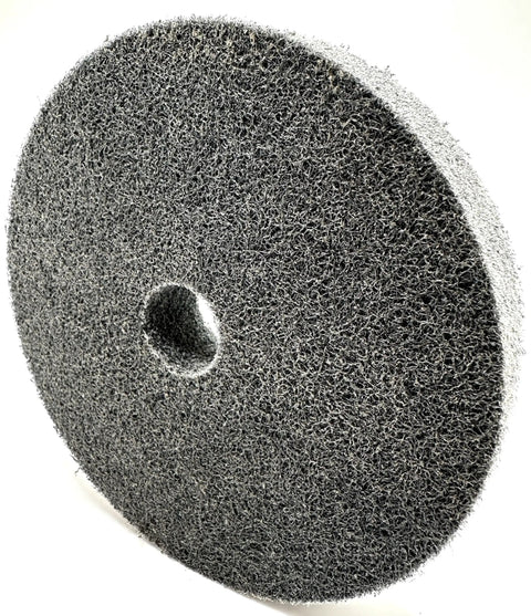 Boss Grade 6 Inch Nylon Fiber Deburring Wheel With 180 Grit Silicon Carbide featuring a center hole for shaft fitting.