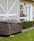 Ravenna 133 Gallon Water Resistant Deck Box For Outdoor Storage beside house, brown fabric, steel frame, yard setting