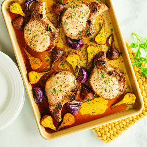 Nonstick Aluminum Half Sheet Pan 13 By 18 Inches With Reinforced Steel Rim For Even Baking And Easy Release Hand Wash Only, cooking dinner with pork chops and vegetables.