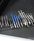 Pliers Holder Organizer For Garage And Workshop 16 Piece Pliers Rack With Three Quarter Inch Slots holding assorted pliers.