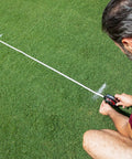 Man using Closed Reel Tape Measure 100 Ft 30 M Hand Crank Dual Sided Feet And Meters Long Measuring Tape For Indoor And Outdoor Projects