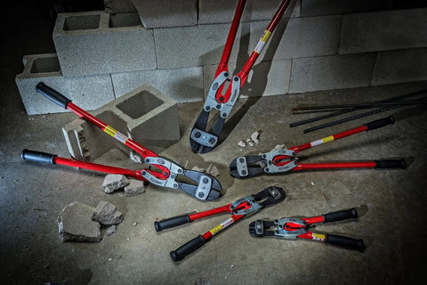 Group of 24 Inch PowerPivot Center Cut Double Compound Action Bolt Cutters with heat treated construction on concrete floor.