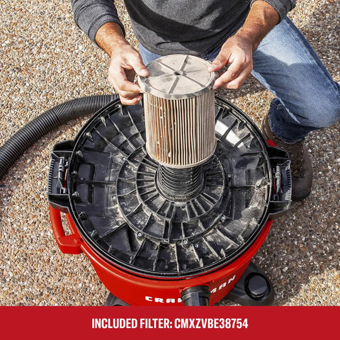 Man assembling filter on 16 Gallon 6.5 Peak HP Wet Dry Shop Vacuum With Built In Blower Port For Quick Outdoor Cleanup Heavy Duty Garage