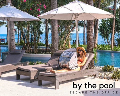 Outdoor Laptop Sun Shade For Working Anywhere Glare Blocker And Heat Reflective Hood Waterproof Foldable Privacy Screen in use by a pool.