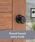 Entry Door Knob With Keyed Lock, SmartKey Re-Key Technology, Microban Protection, Venetian Bronze Finish, Easy DIY Install For Exterior Or Interior Doors, Secure, Weather-Resistant, Lifetime Reliability on wooden door
