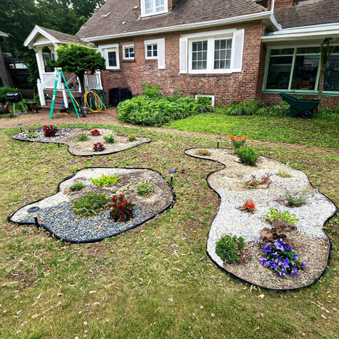 2 Inch By 50 Foot Landscape Edging Border Kit With 75 Anchoring Spikes No Dig Garden Border for lawn and flower beds shown in use