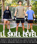 Three youths stand with lacrosse sticks in front of an Official 6x6 Lacrosse Goal With Quikset Net Attachment for backyard practice.
