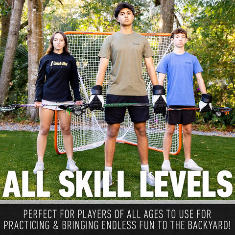 Three youths stand with lacrosse sticks in front of an Official 6x6 Lacrosse Goal With Quikset Net Attachment for backyard practice.