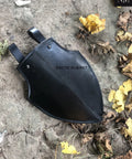 Medieval Markward Shield Tasset Armor for Cosplay and LARP on ground, blackened steel with dual belt loops