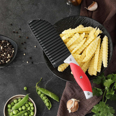 Crinkle cutter knife with red rubber handle and ribbed blade for fries and vegetables.
