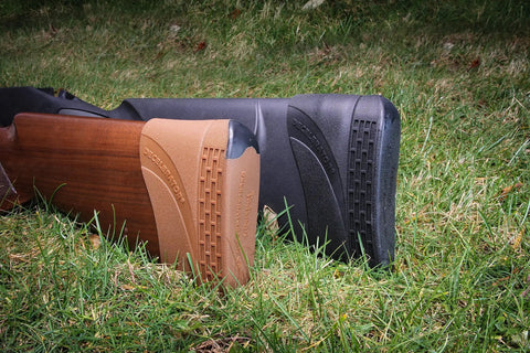 Slip-On Decelerator Recoil Pad For Long Guns, Easy DIY Install, Medium Black on rifle stock in grass setting