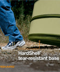 Person stepping on Kangaroo Collapsible Garden Bag with Heavy Duty Hardshell Bottom for Yard Waste and Lawn Care, 30 Gallon Reusable Container.