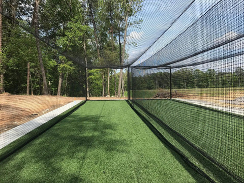 Outdoor view of Heavy Duty HDPE Batting Cage Net For Baseball And Softball Training Gauge 42 Twine, Net Only No Frame.