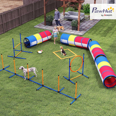 Outdoor scene with dogs using All In One Dog Agility Training Set 12 Piece Obstacle Course With Adjustable Hurdle And Ring Four Tunnels