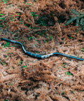 Upturn High Rise Mountain Bike Handlebar 35mm Clamp 800mm Wide 75mm Rise Alloy Riser Bar For MTB And BMX on forest floor