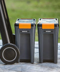 Level Up Your Smoke Game With This Heavy Duty Pellet Storage Bin Featuring A Rugged Locking Lid And Smart Stackable Design To Keep Wood Chips Bone Dry For Peak Grilling Days. Two stackable gray pellet containers labeled Maple and Hickory.
