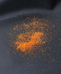 Waterproof Front Car Seat Cover Protector Universal Fit For Cars And Trucks Easy Install Reusable Black Seat Protector Against Water Dirt Sweat And Pet Hair with orange powder on fabric surface.