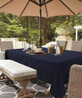Outdoor Table Cover With Umbrella Hole And Zipper 60x84 Inch Navy Low Maintenance Washable Waterproof Spill Proof Wrinkle Free Tablecloth For Patio Porch Spring Summer Bbqs Picnics on patio dining table under umbrella.