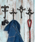 Built Like A Tank Cast Iron Wall Mount Key Hooks For Entryway And Garage Featuring Classic Fleur De Lis Charm Dark Brown coat and keys hanging.