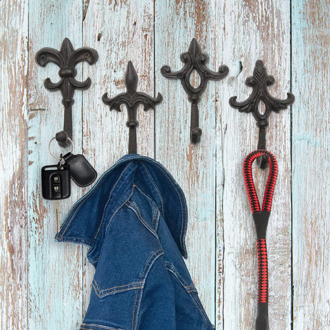 Built Like A Tank Cast Iron Wall Mount Key Hooks For Entryway And Garage Featuring Classic Fleur De Lis Charm Dark Brown coat and keys hanging.
