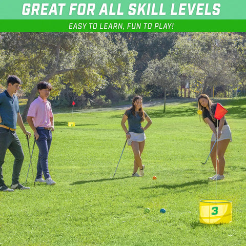 Yard Links Backyard Golf Game Outdoor Chipping Set For Family Fun And Your Crew Easy To Learn On The Lawn Beach Or Park Build A 3 Hole Course Includes 3 Buckets 3 Flags 3 Tee Markers 4 Golf Balls Scorecard And Carry Case. Group playing backyard golf on grass with bucket hole and flags