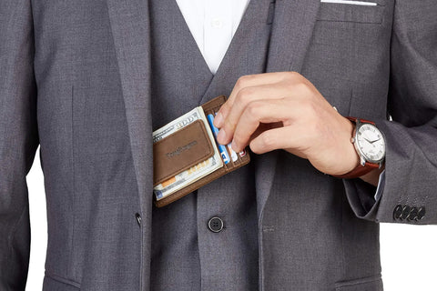 Man holding Ultra Slim Wallet For Men With RFID Blocking 13.56 MHz, Front Pocket Money Clip, Minimalist Card Holder, Coffee Color