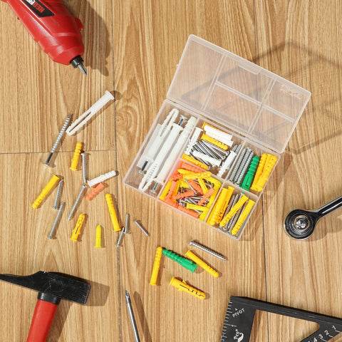 Drywall Anchors And Screws Kit With 100 Pieces on wooden floor with tools, includes 50 plastic wall anchors and 50 metal screws.