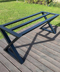 Beefy Heavy Duty Metal Table Base Built To Last With 700 Lb Capacity 28 Inch Height Industrial Table Frame outdoors on deck
